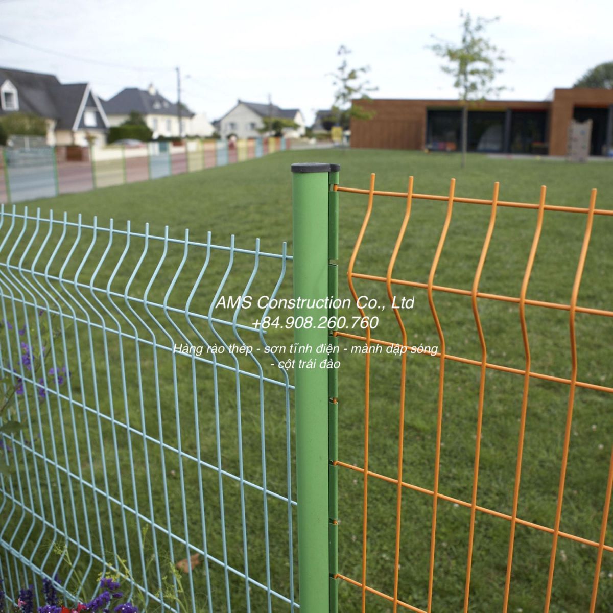 A picture containing fence, outdoor, building, greenDescription automatically generated